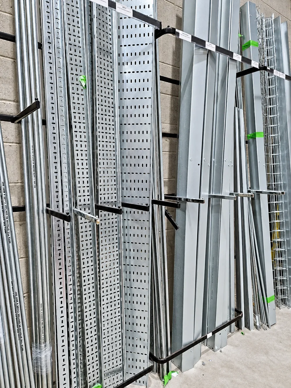 Conduit, cable tray, trunking and wire basket on a product rack